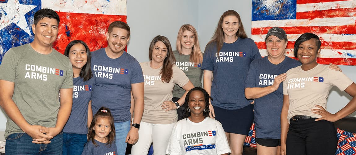 A group of smiling Combined Arms team members.