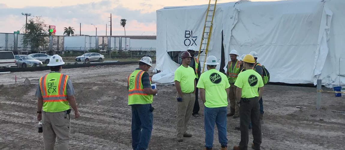 A group of Craft Electric workers hanging out on the site.